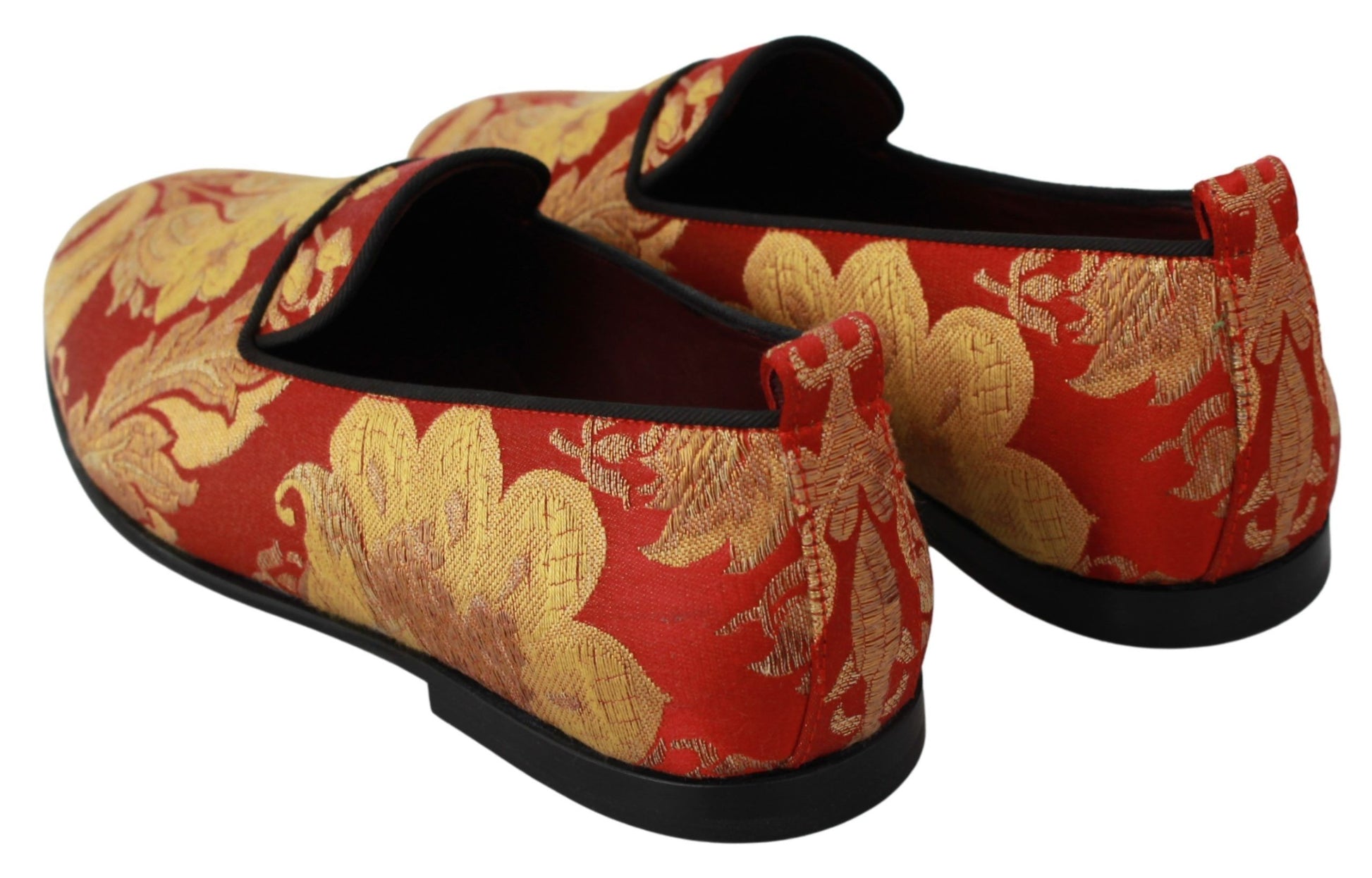 Pair of traditional Chinese shoes with red and gold designs