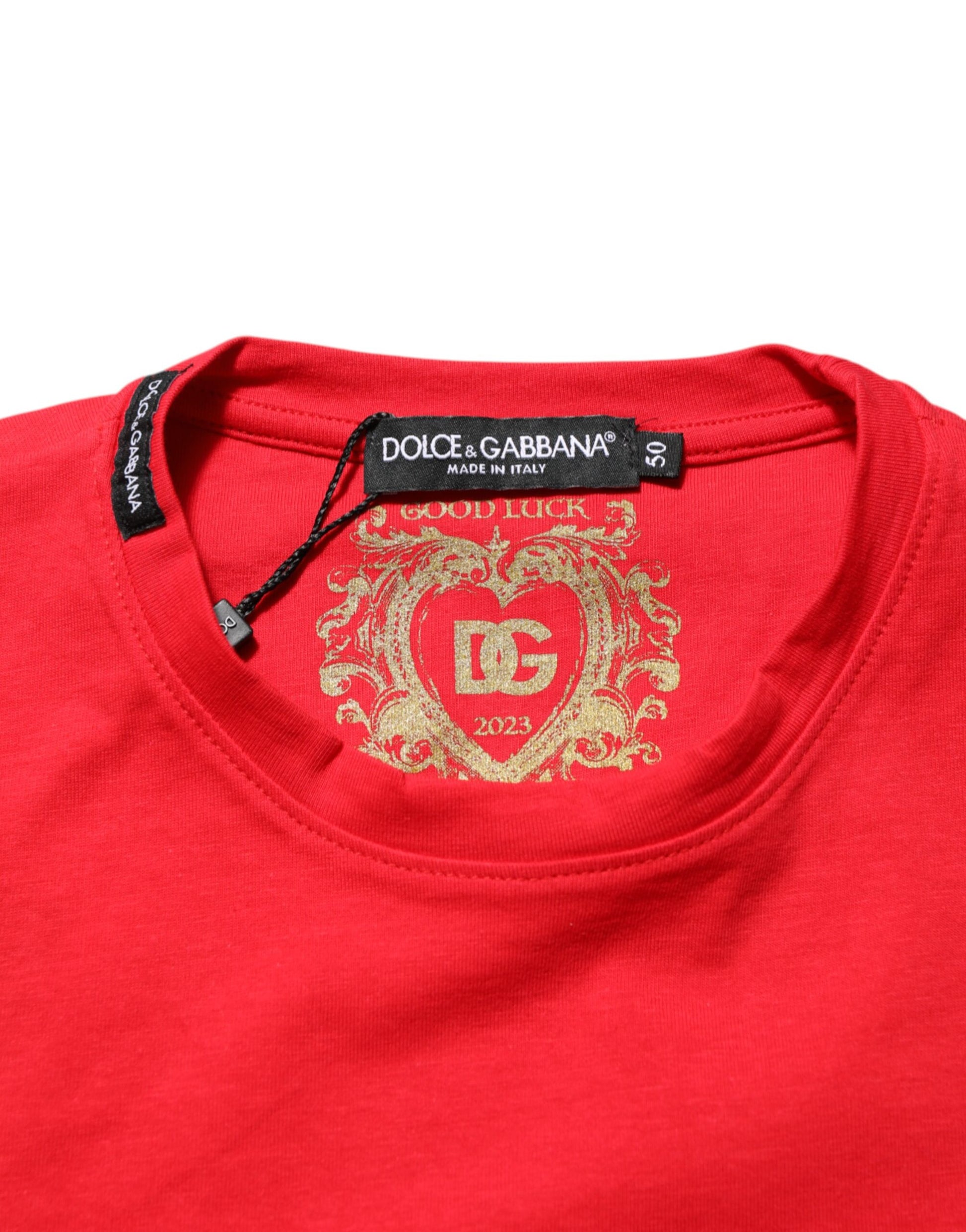 Red t-shirt with gold logo on front