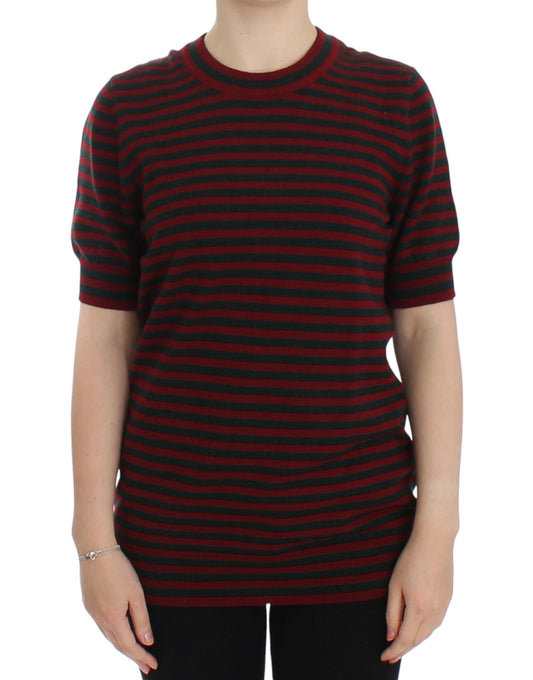 Red and black striped sweater worn by woman