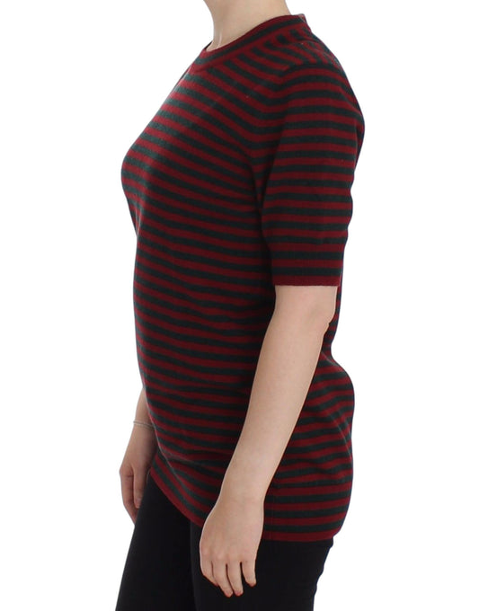Woman wearing a black and red striped sweater