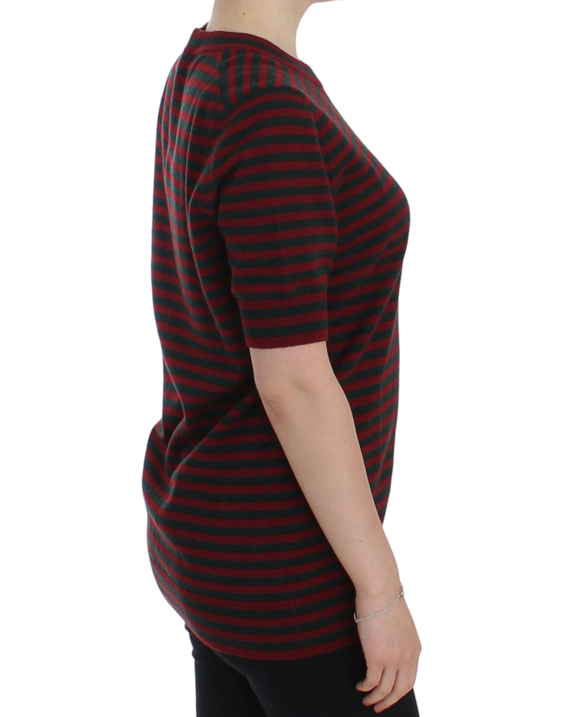 Woman wearing a black and red striped sweater