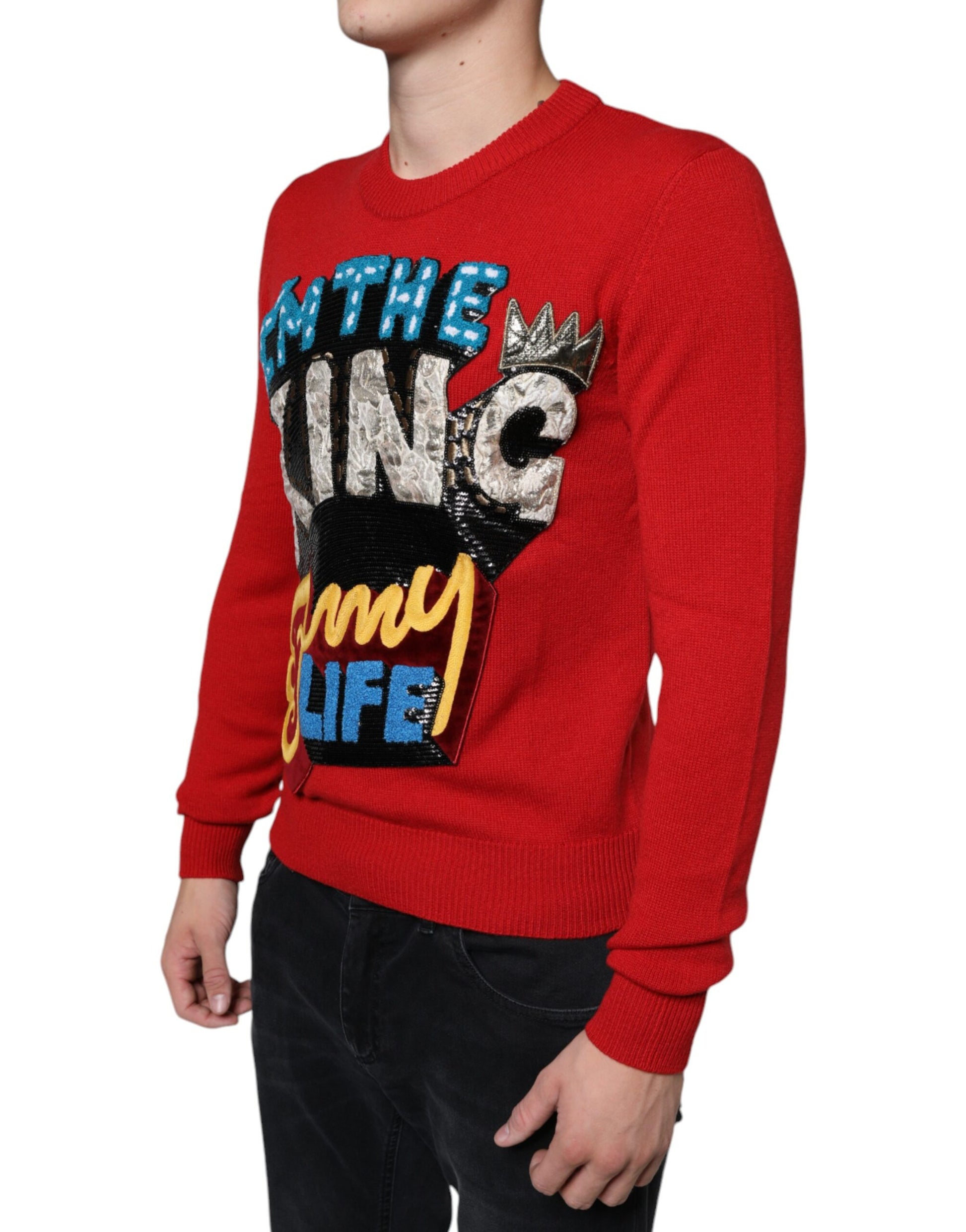 Red sweater with "The King" graphic design
