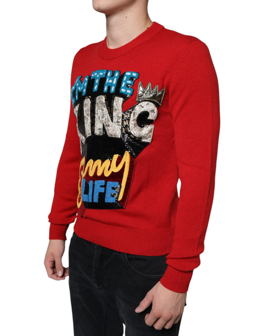 Red sweater with "The King" graphic design