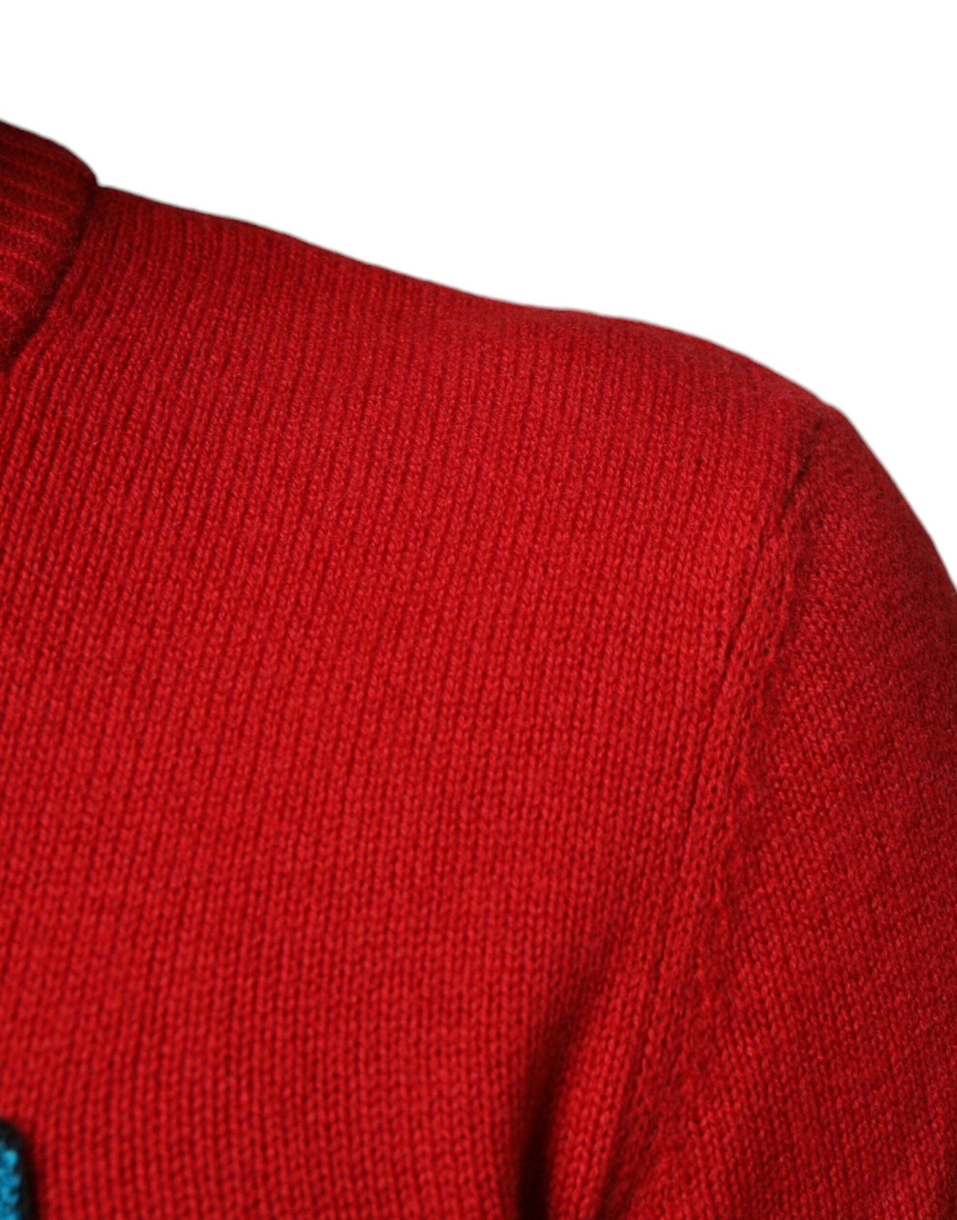Red knit sweater on mannequin