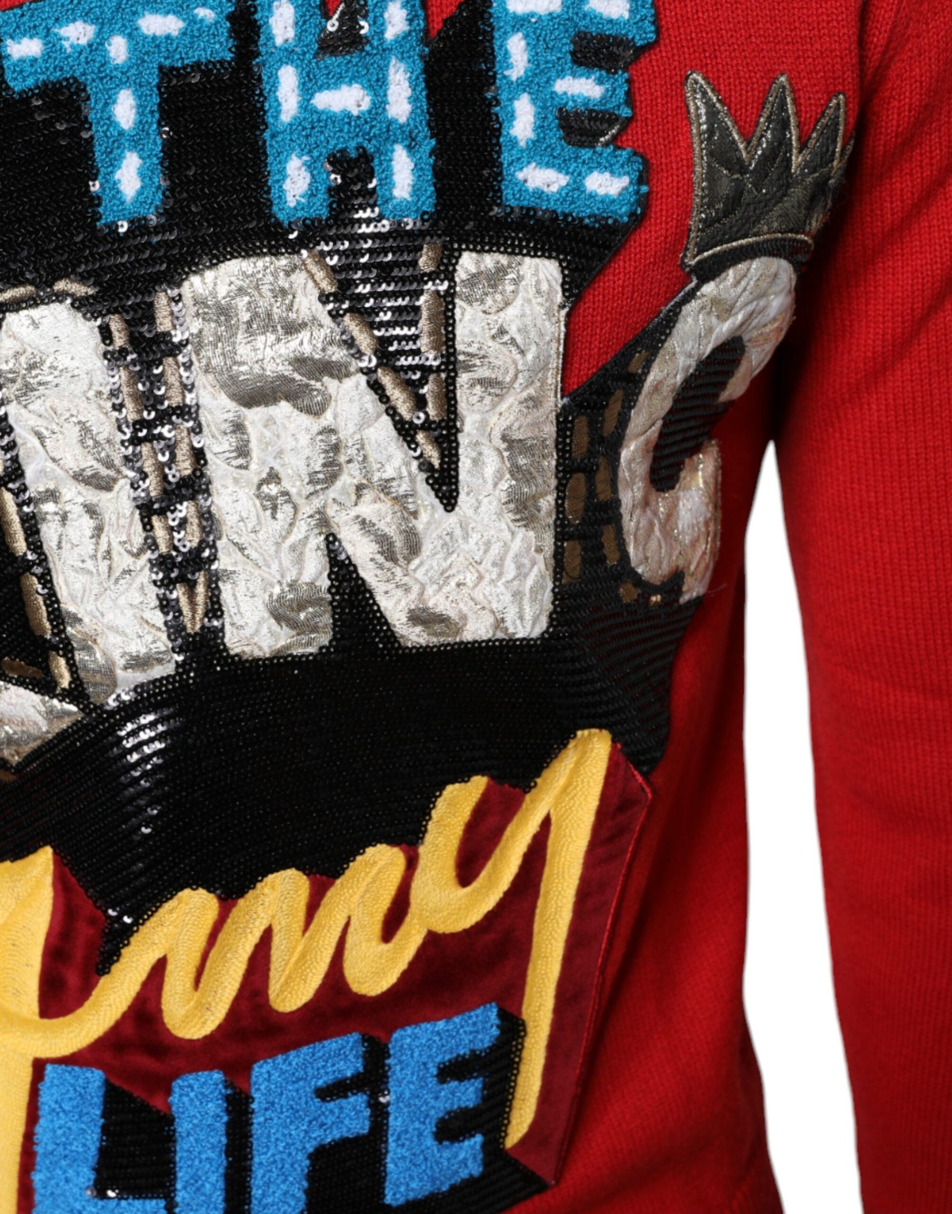 Red sweater with colorful lettering