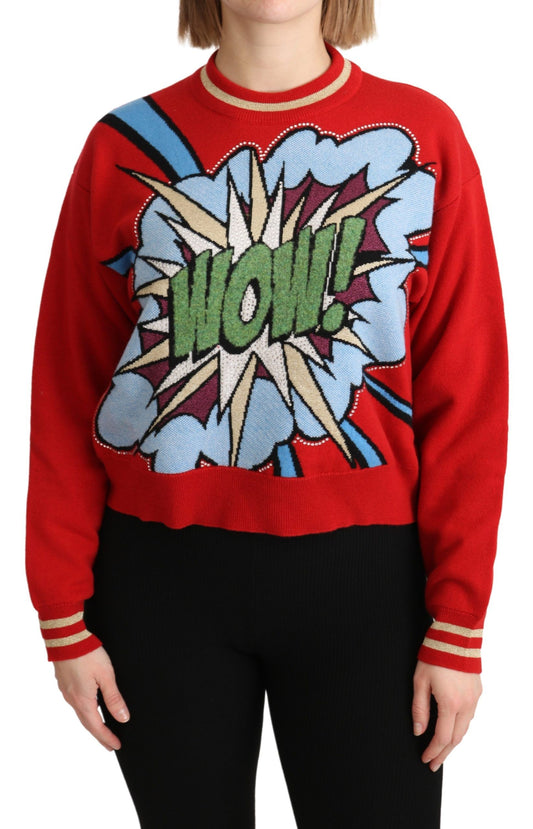 Woman wearing a red sweater with a comic book style "WOW!" graphic on front