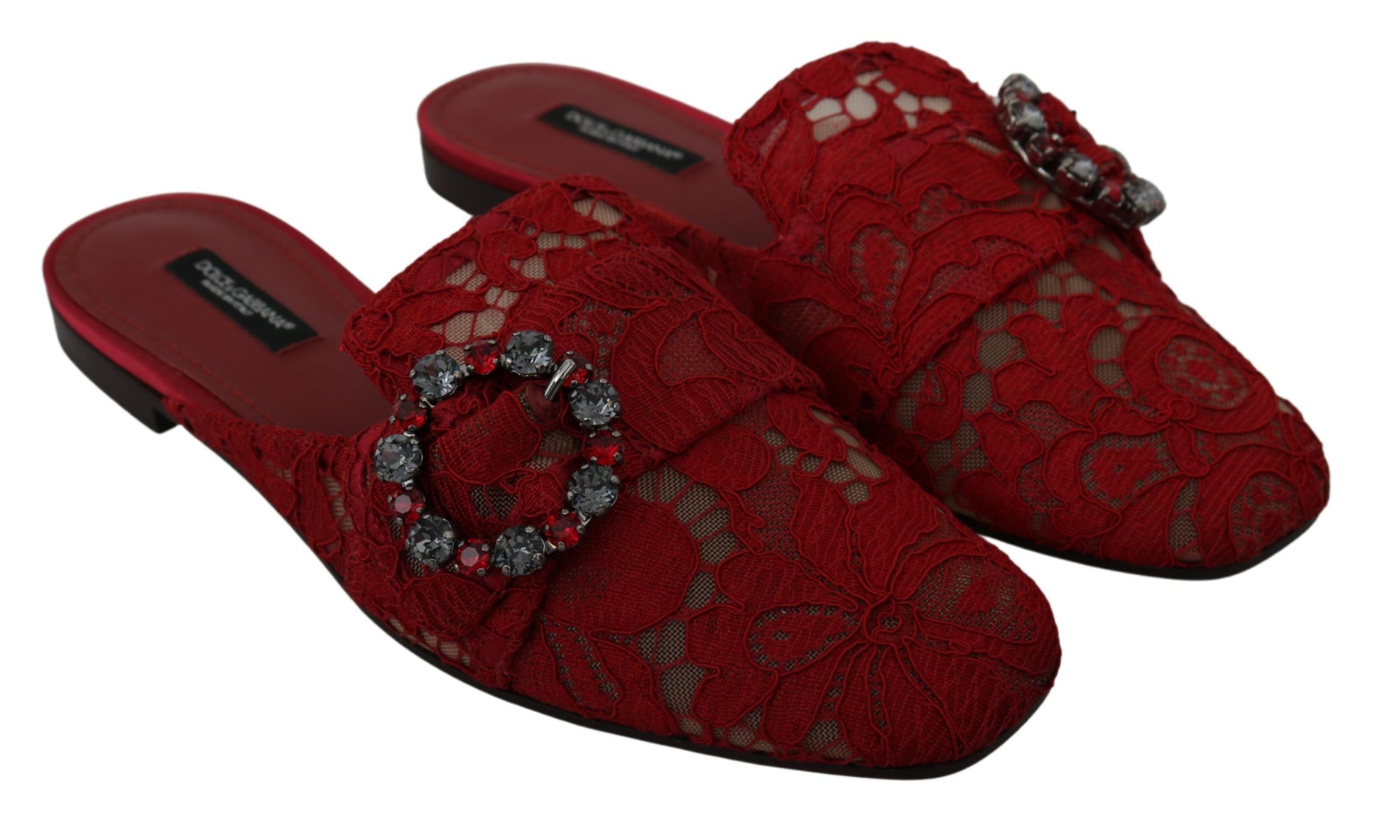 Red embroidered slippers with beaded accents and a bow on top