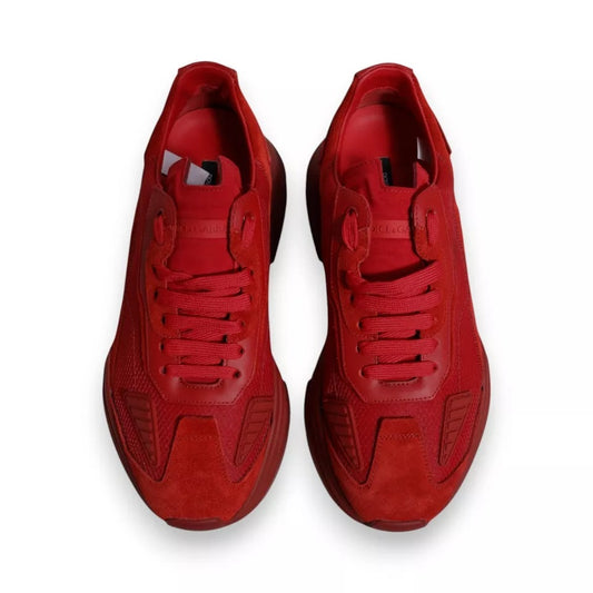Red sneakers on white background