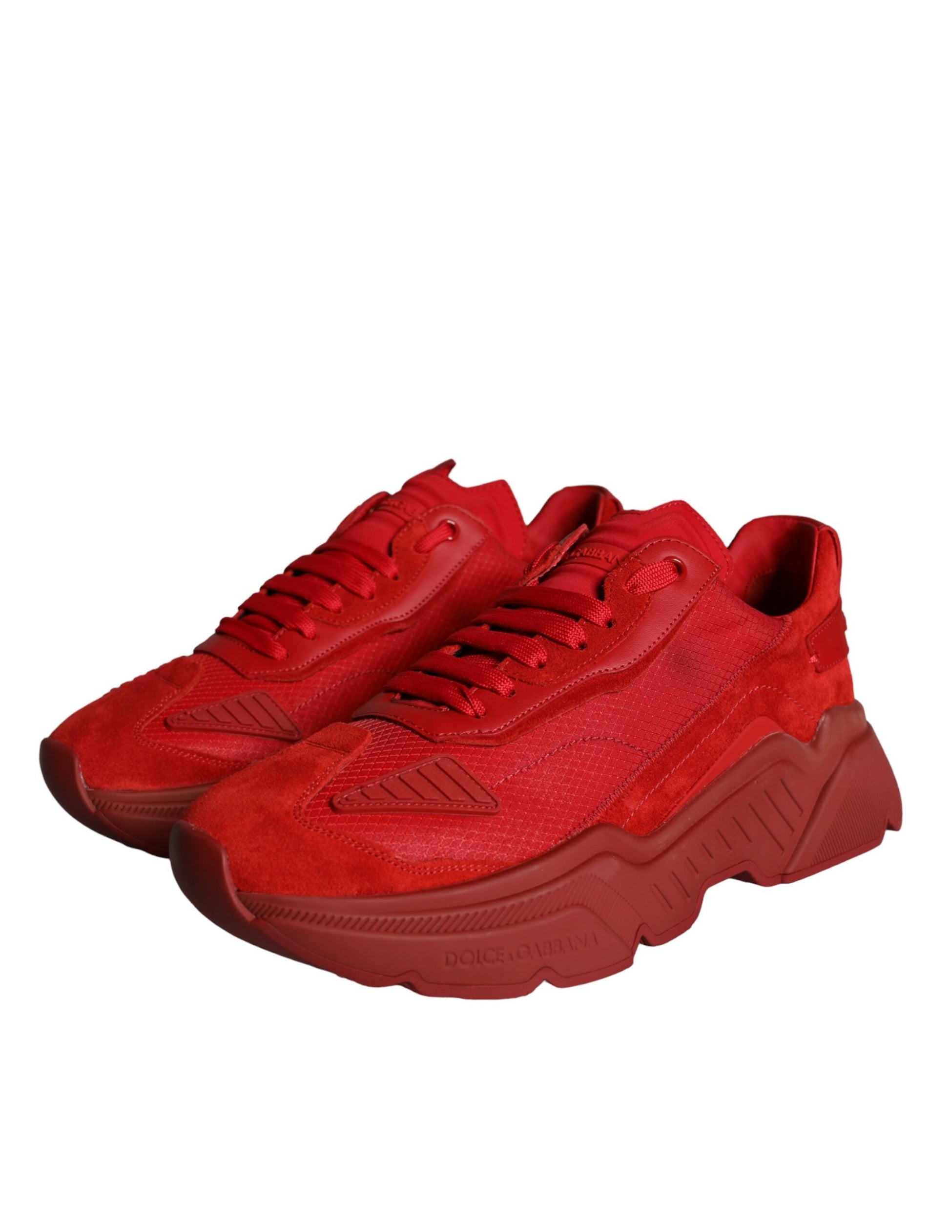 Red leather sneakers with white soles, laces and logo