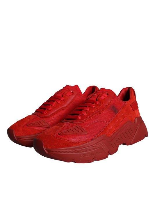 Red leather sneakers with white soles, laces and logo on side