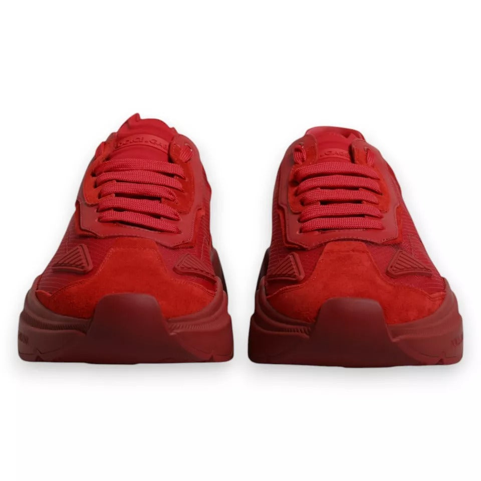 Pair of red sneakers with white soles