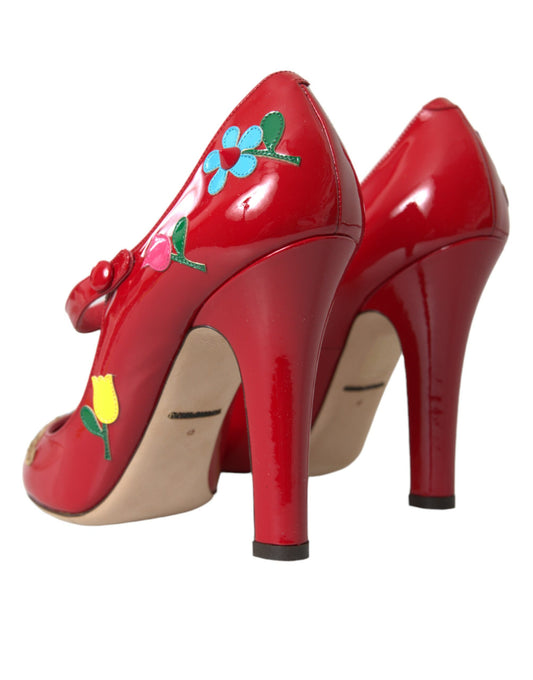 Red high heel shoes with floral designs on toe and heel