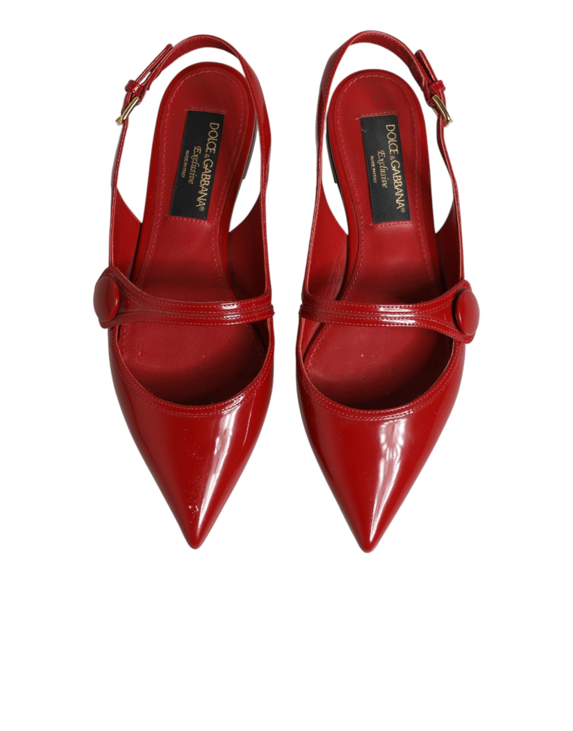 Red high heel shoes with strap detailing