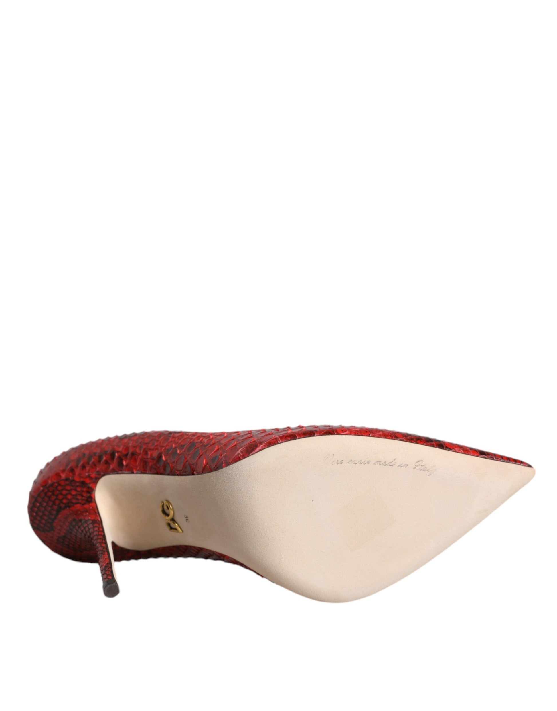 High heel shoe with red snake skin texture on toe cap
