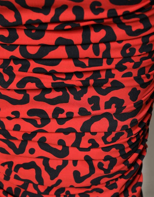 A red leopard print nylon sheath midi dress by Dolce & Gabbana