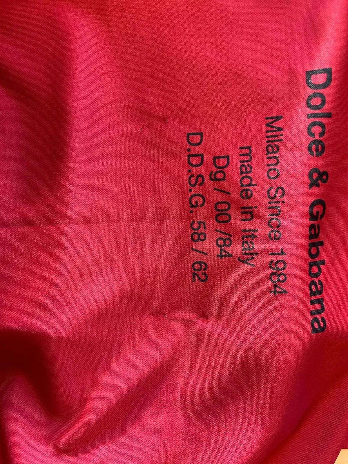 Red fabric with white lettering