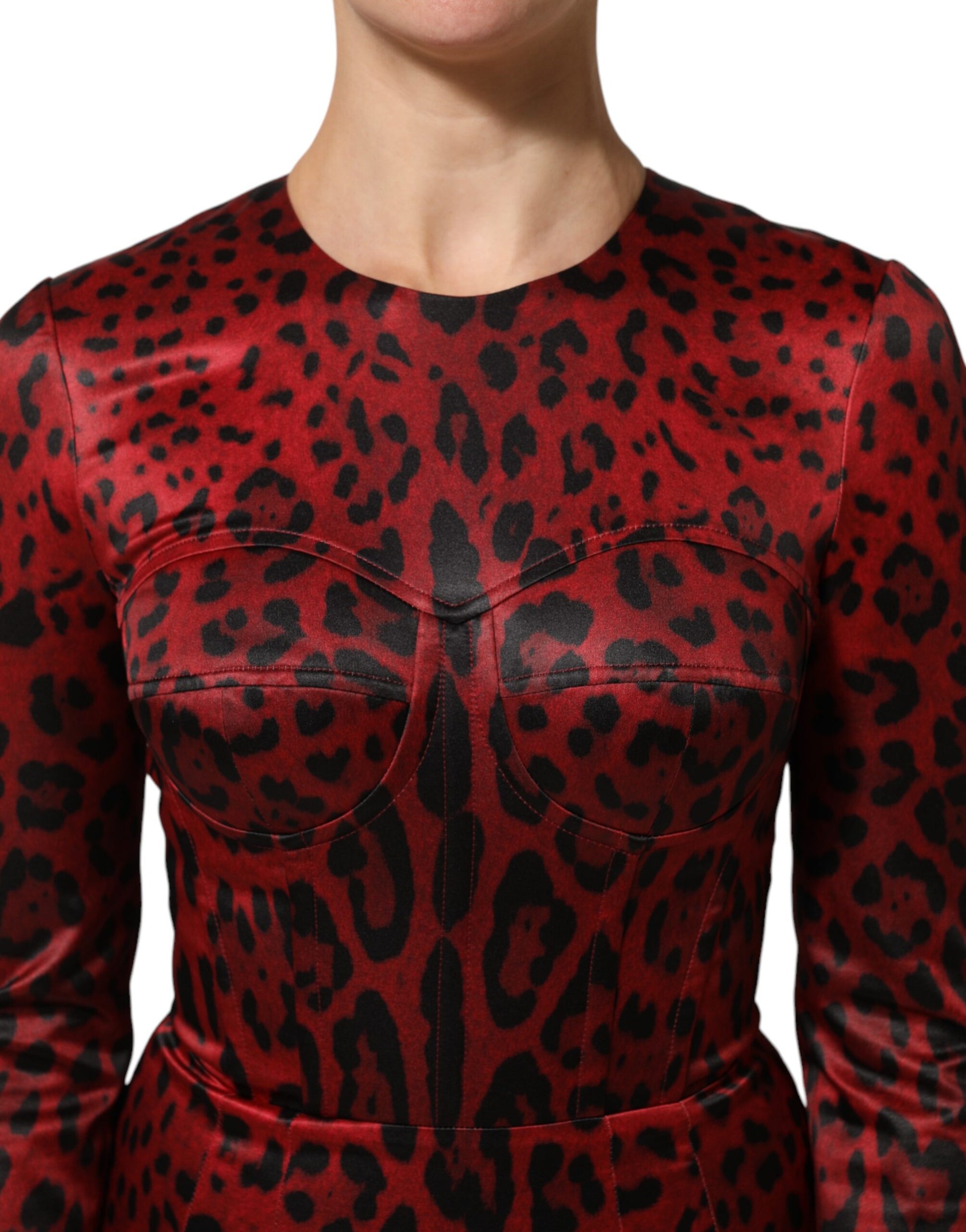 A red leopard print dress with long sleeves and a sheath silhouette