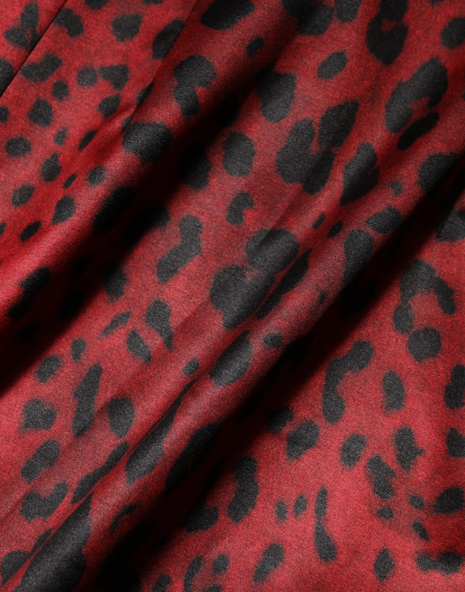 A red leopard print sheath dress with long sleeves