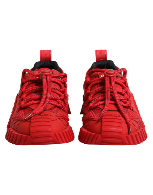 Pair of red baby shoes with laces