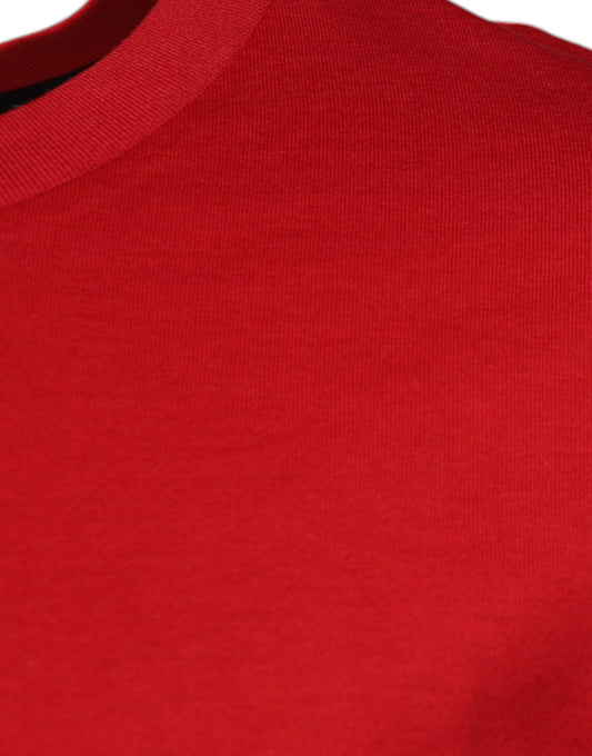 Red long sleeve shirt on hanger