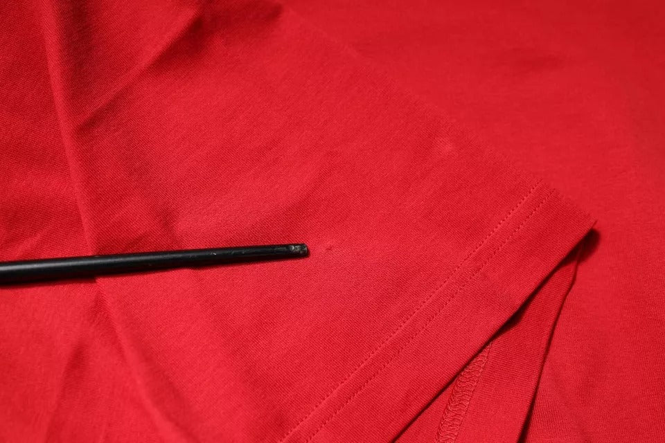 Black pen on red cloth