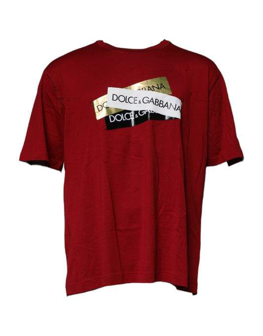 A red crew neck t-shirt with a logo on the front