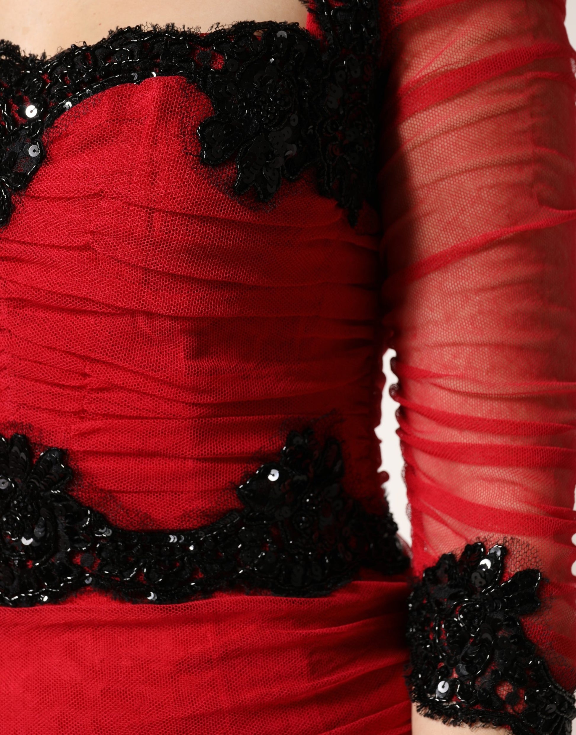 A red mesh trim bodycon sheath midi dress with black sequins and ruffles