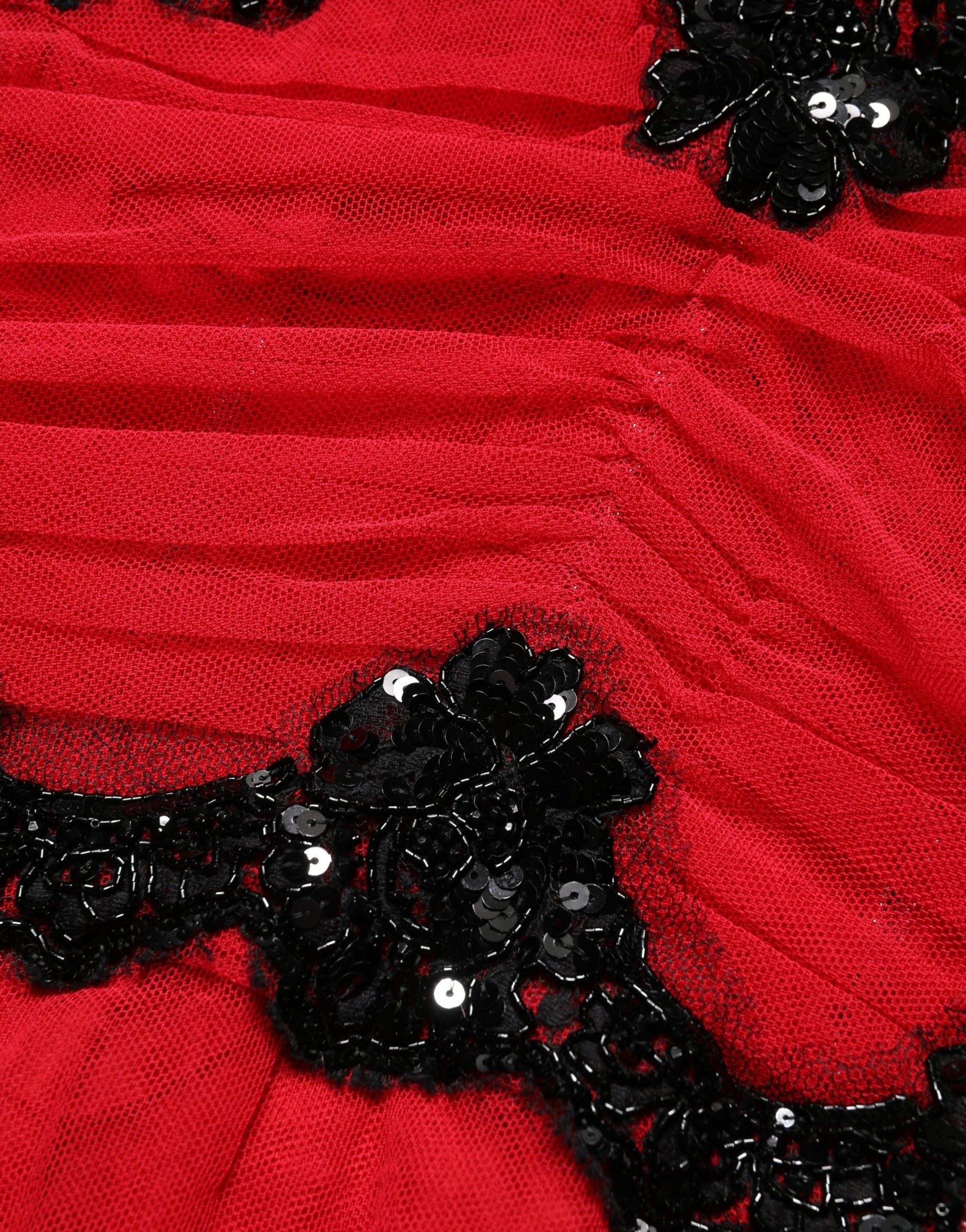 A red mesh trim bodycon sheath midi dress with black sequins and beads