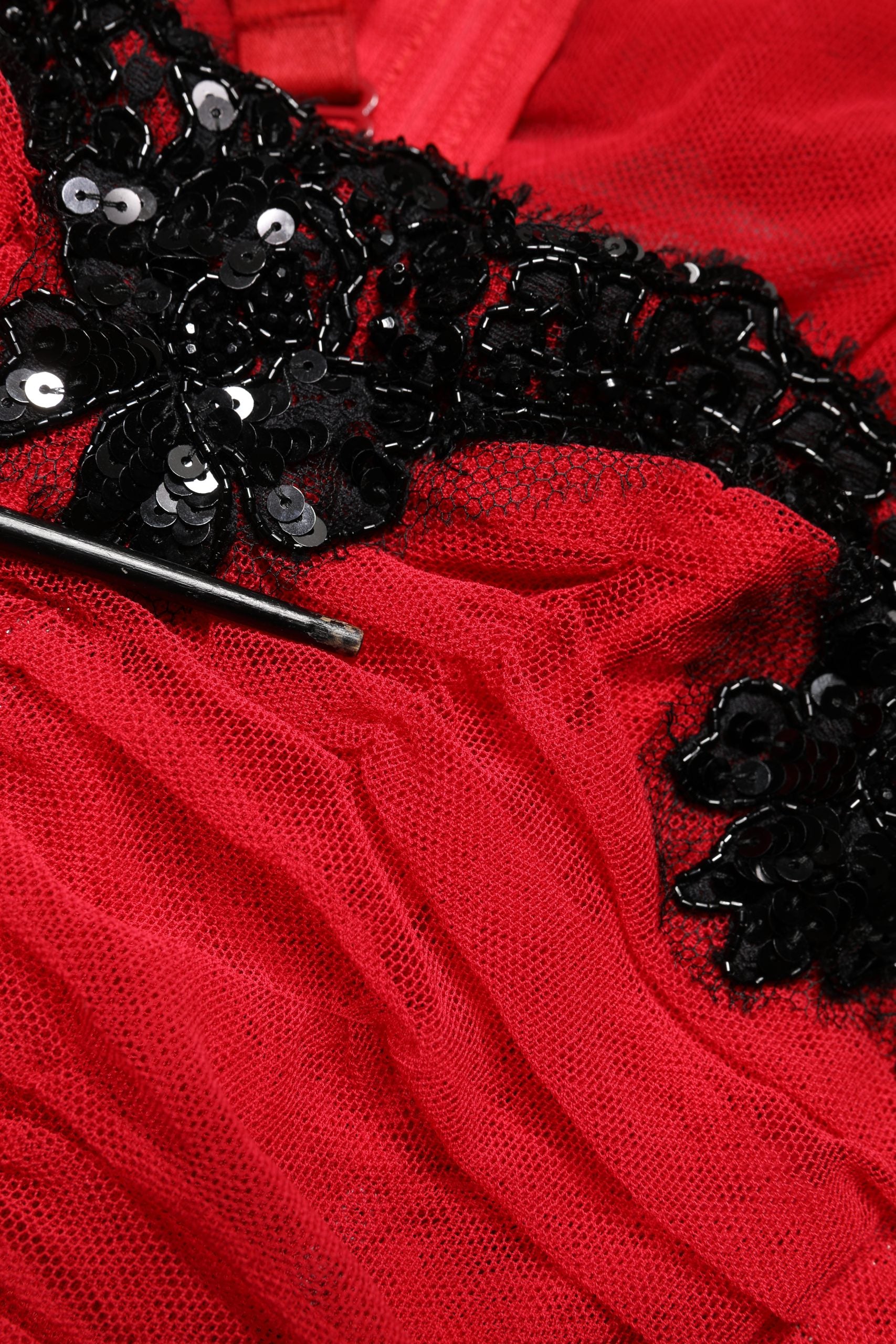 A red mesh trim bodycon sheath midi dress with black sequins and a black zipper