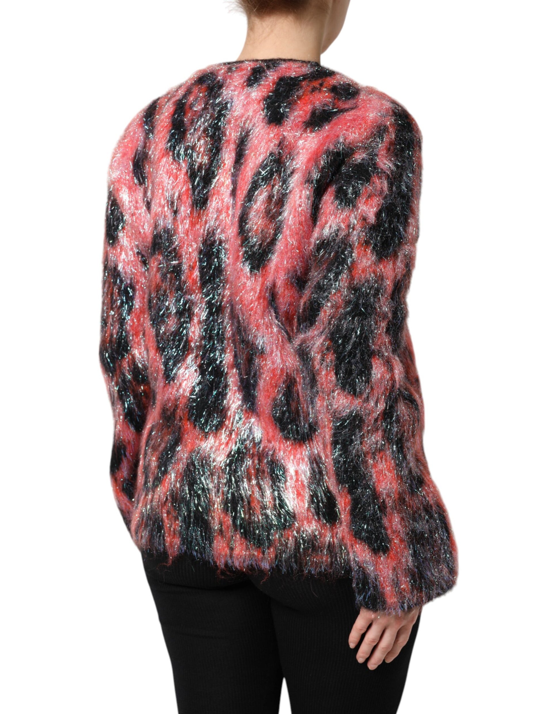 Woman wearing a colorful, patterned sweater