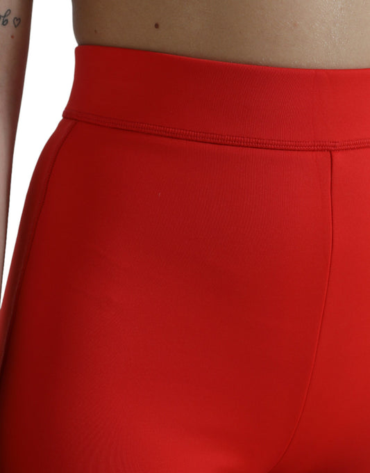 Red leggings on a person's waist
