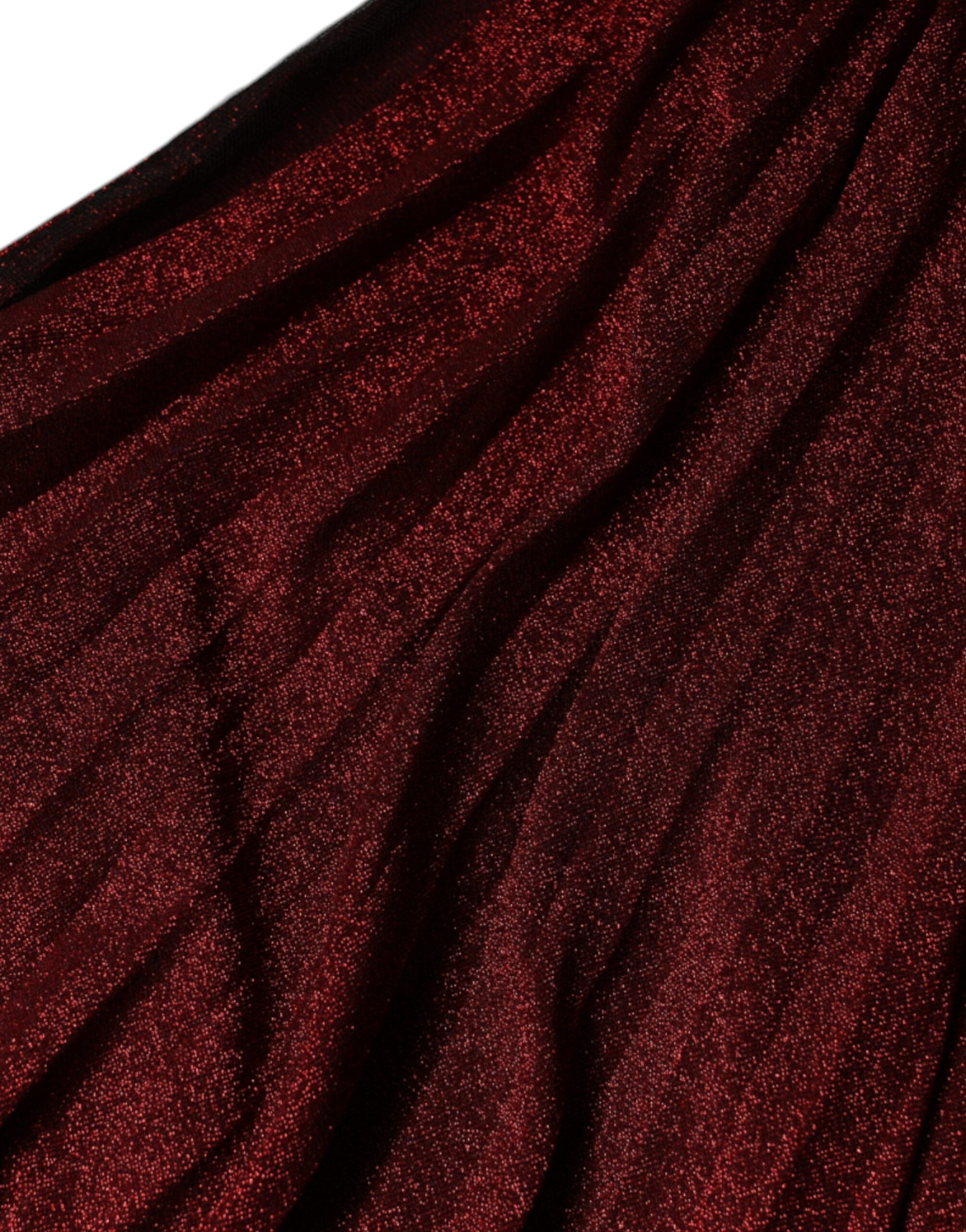 A red one shoulder pleated A-line mini dress with sequin detailing