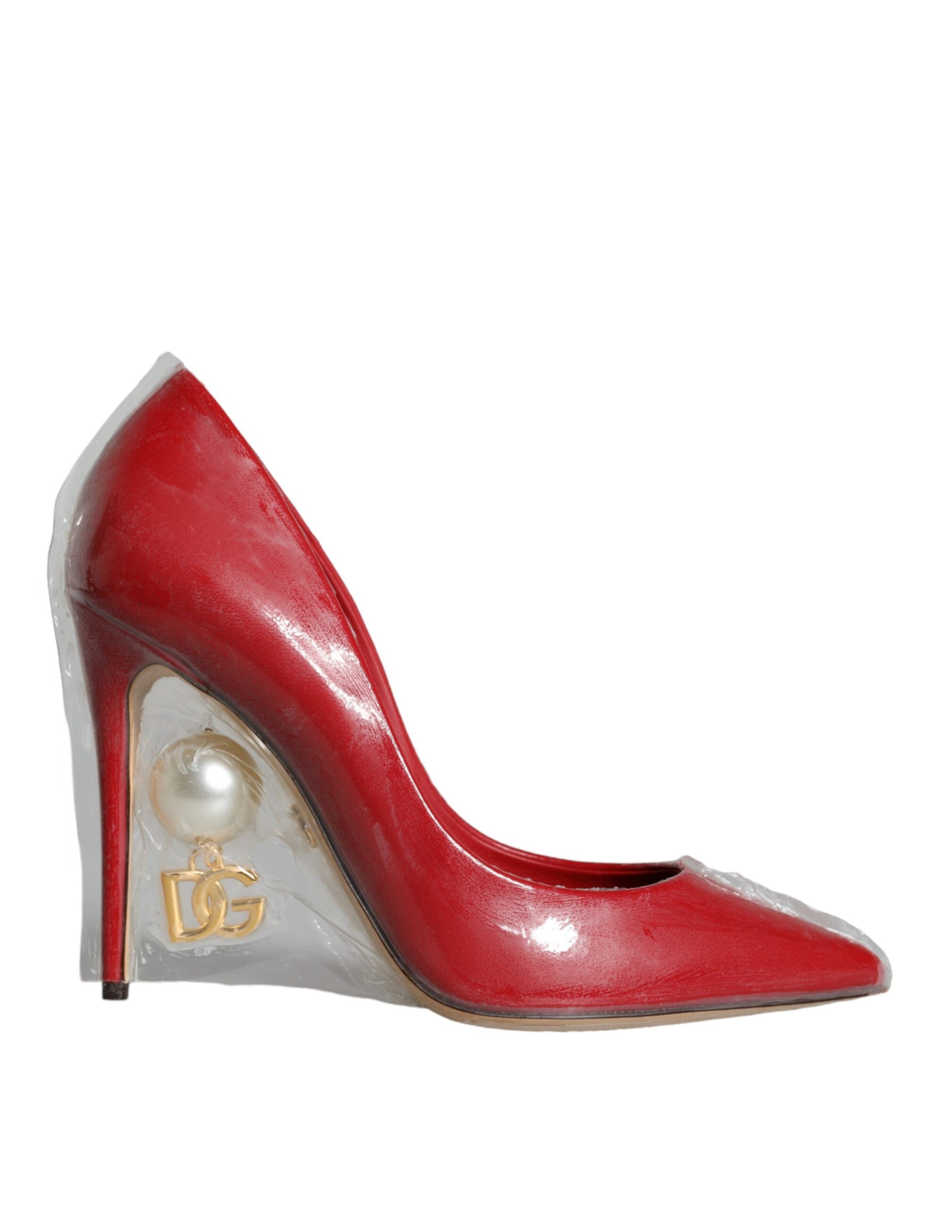 Red high heel shoe with a pearl on the toe