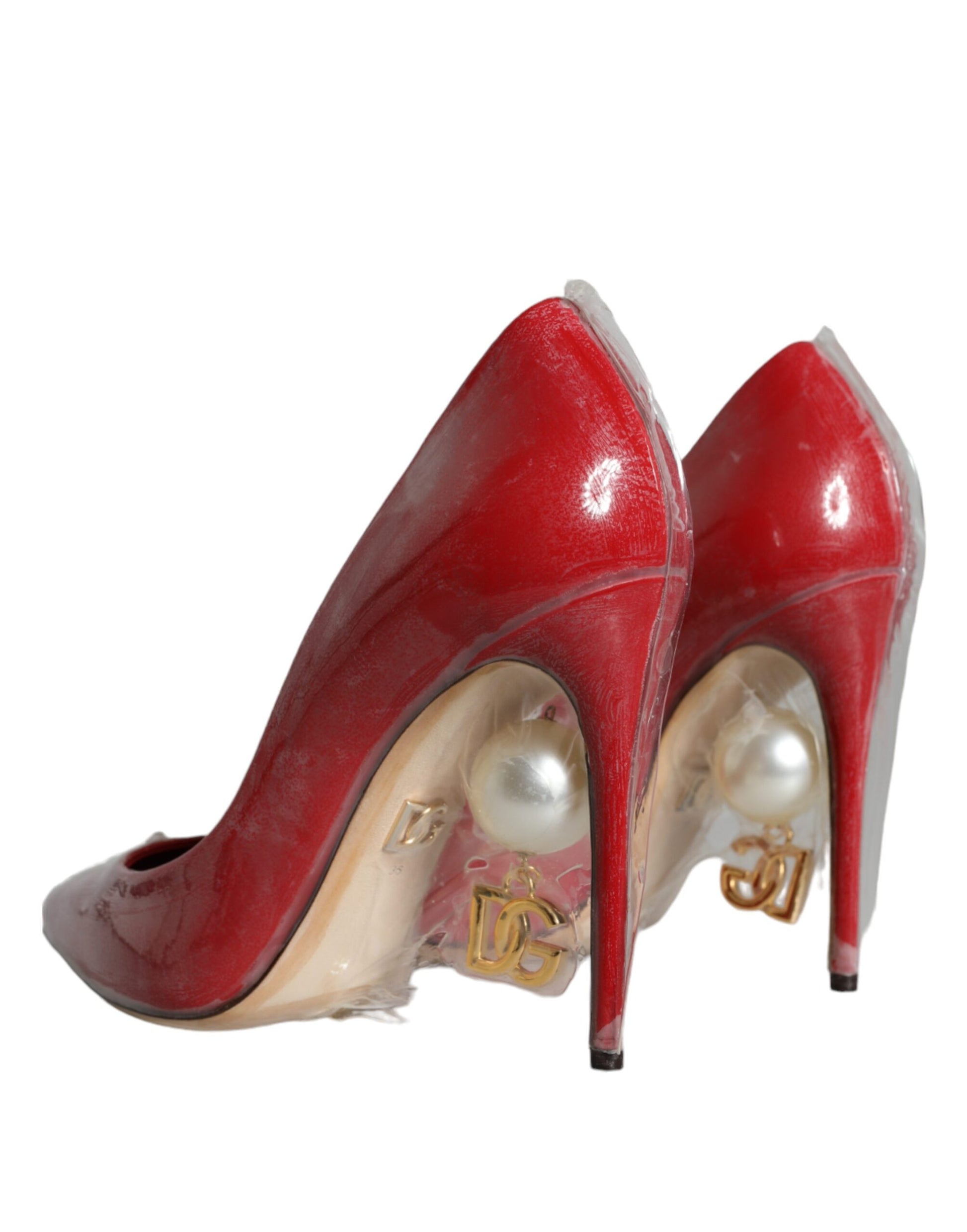 Red high heel shoes with pearl accents