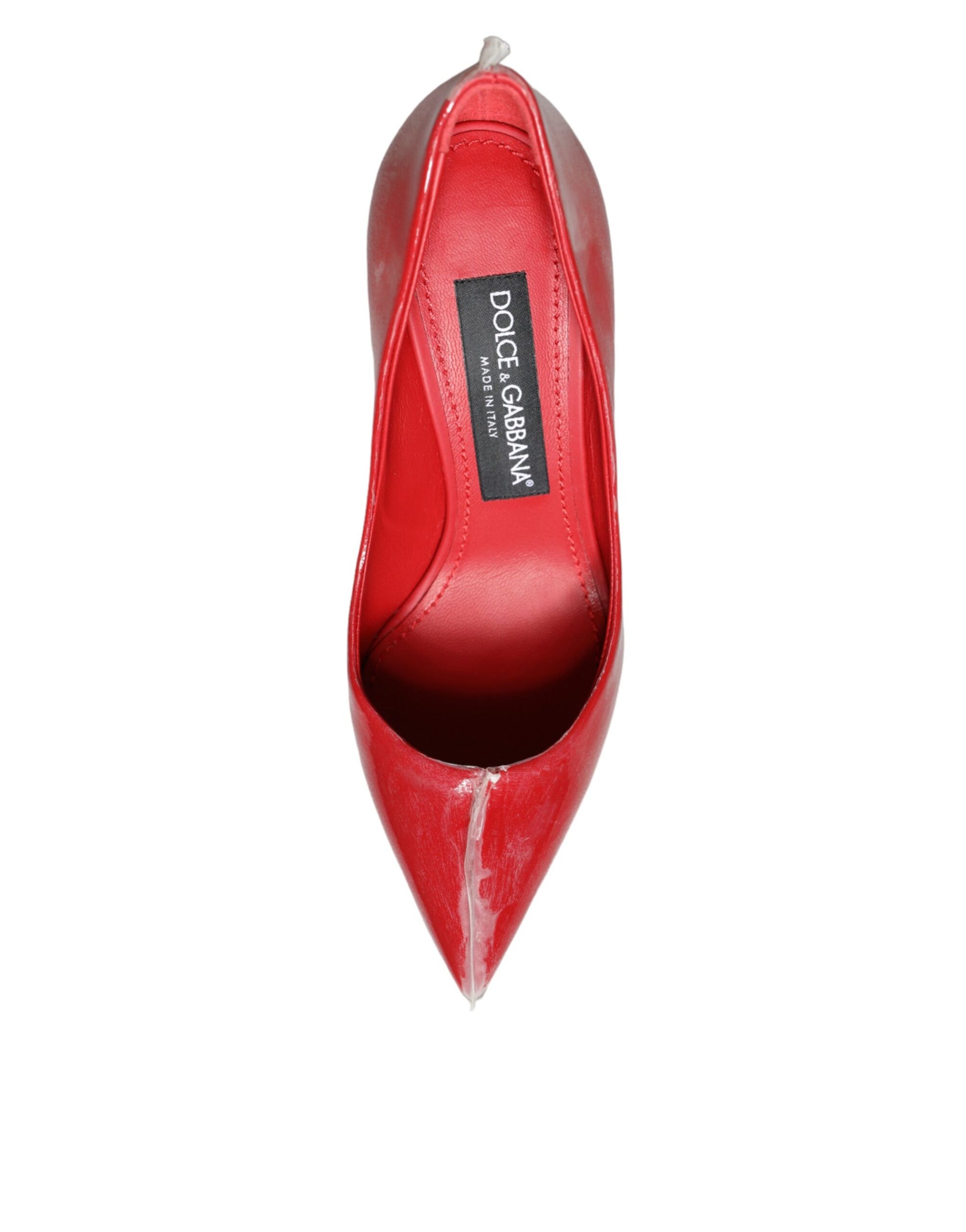 Red high heel shoe on white background