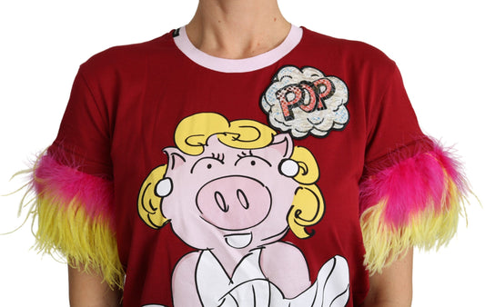 Red shirt with cartoon pig on front