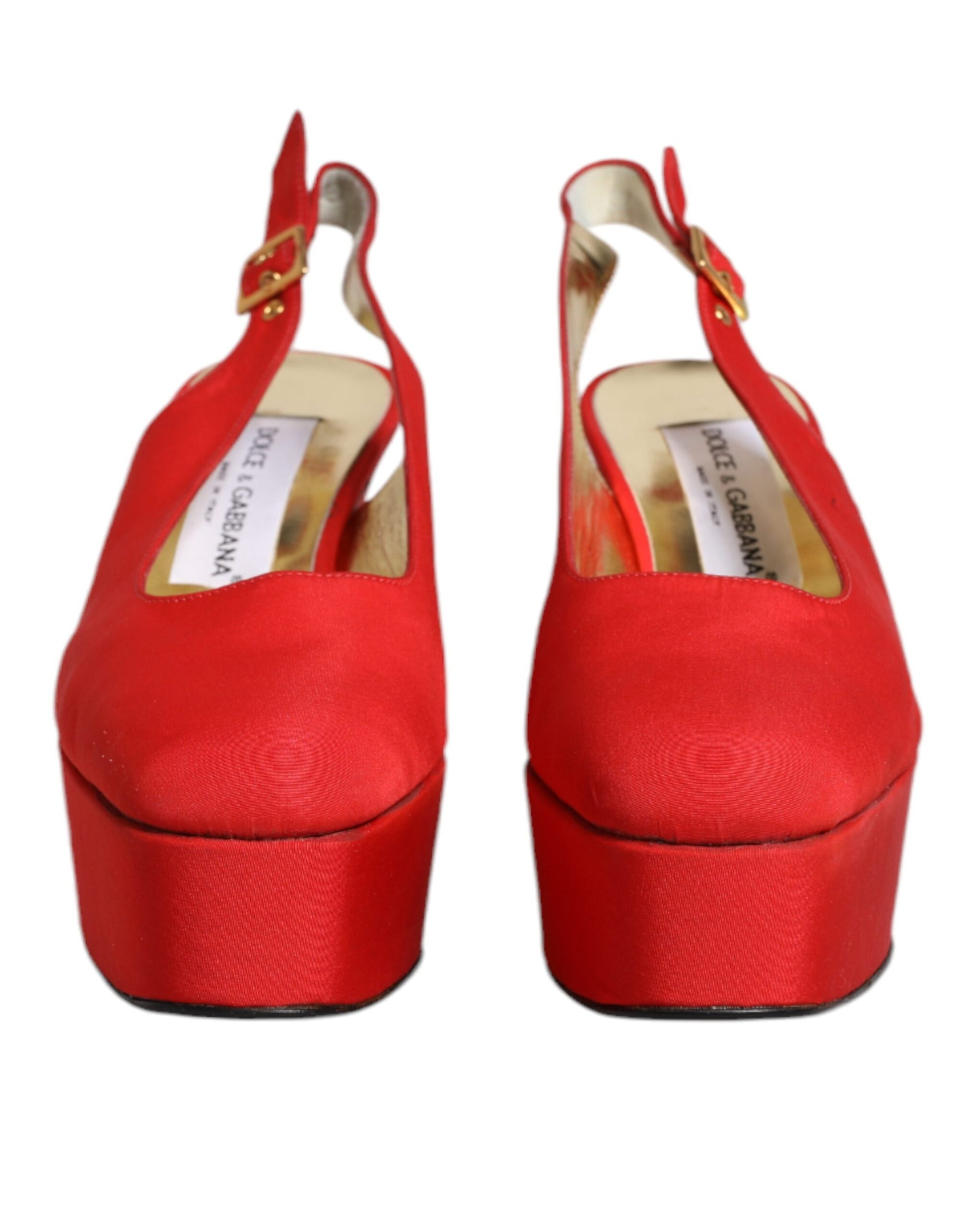 Red high heel shoes with gold trim