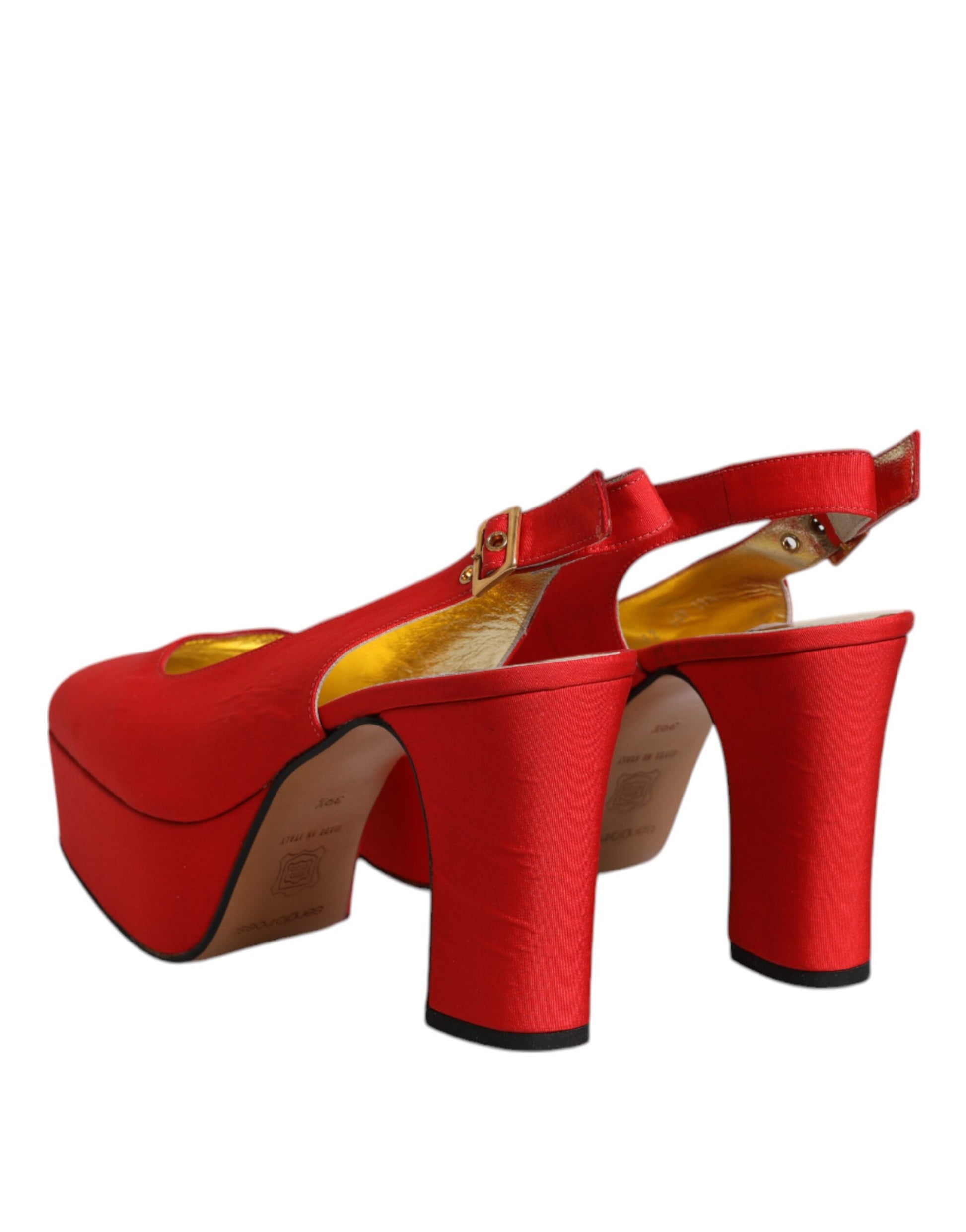 Red high heel shoes with gold accents