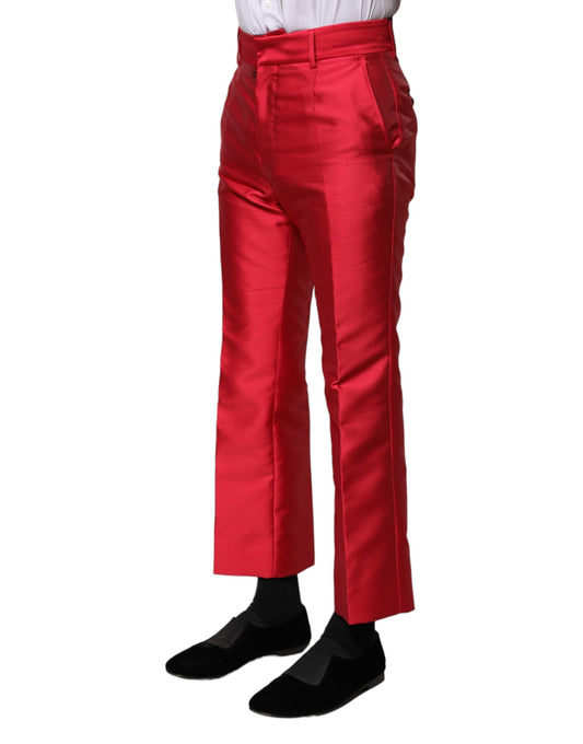 A pair of red polyester cropped dress pants with a high waist and wide legs, designed by Dolce & Gabbana
