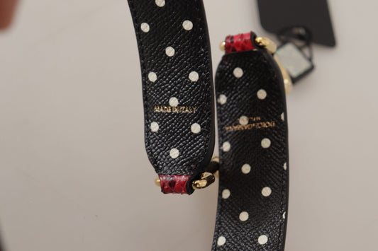 Black belt with red polka dots and gold buckle