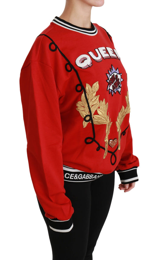 Red sweatshirt with gold design on front