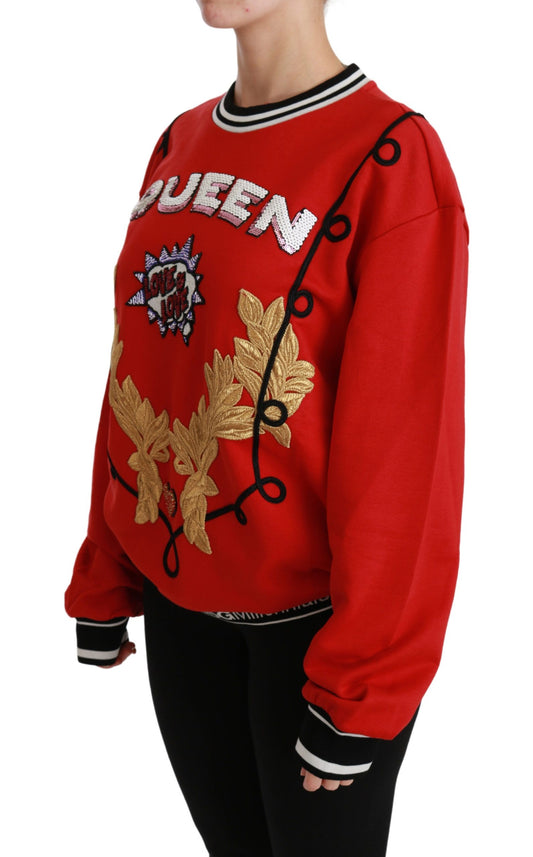 Red sweater with gold embroidery on front