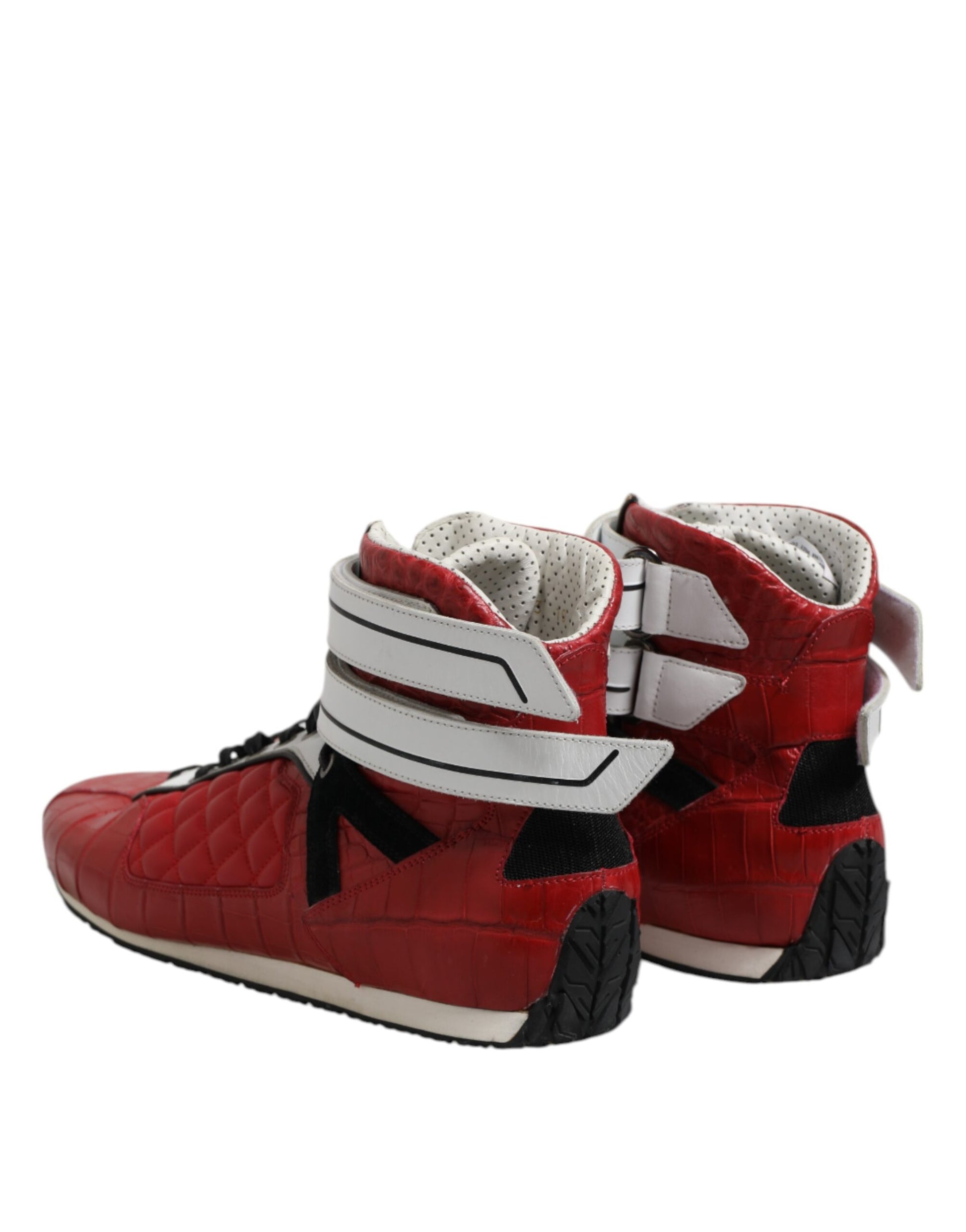 Red snow boot with white laces and black sole
