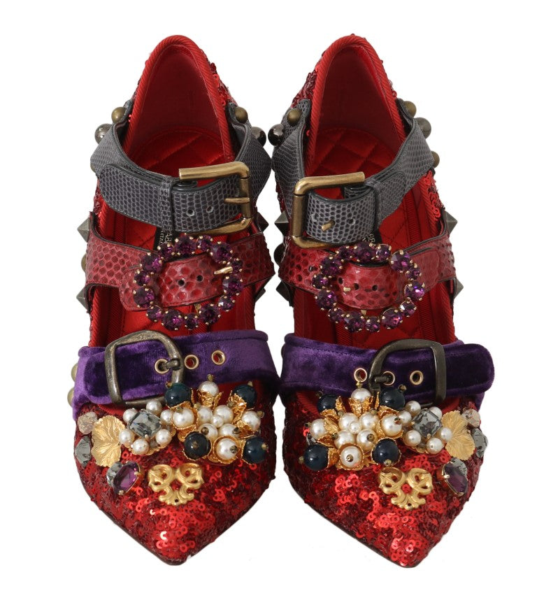 Pair of red shoes with multiple straps and embellishments