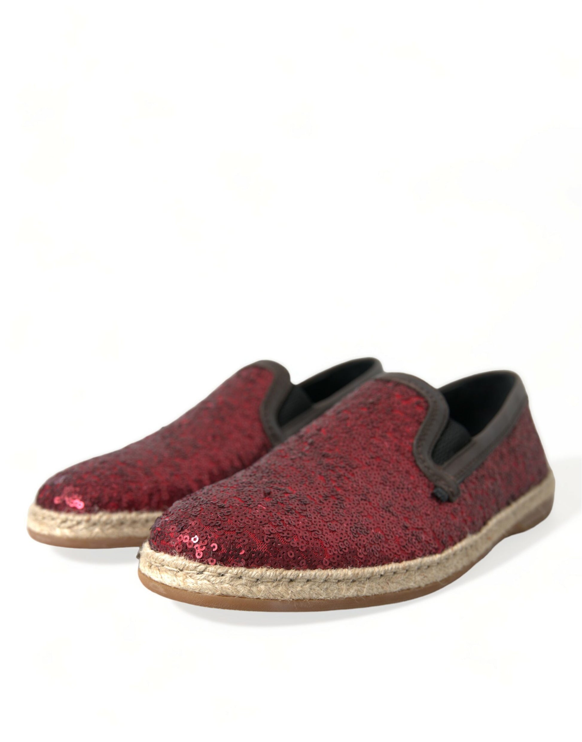 Red velvet slippers with gold trim and a wedge heel