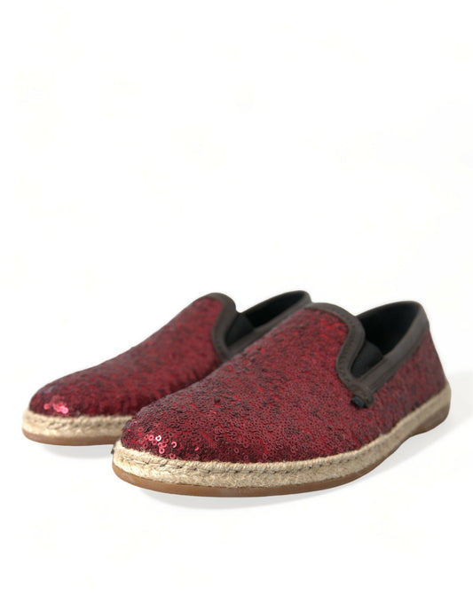 Red velvet slippers with gold trim and a wedge heel