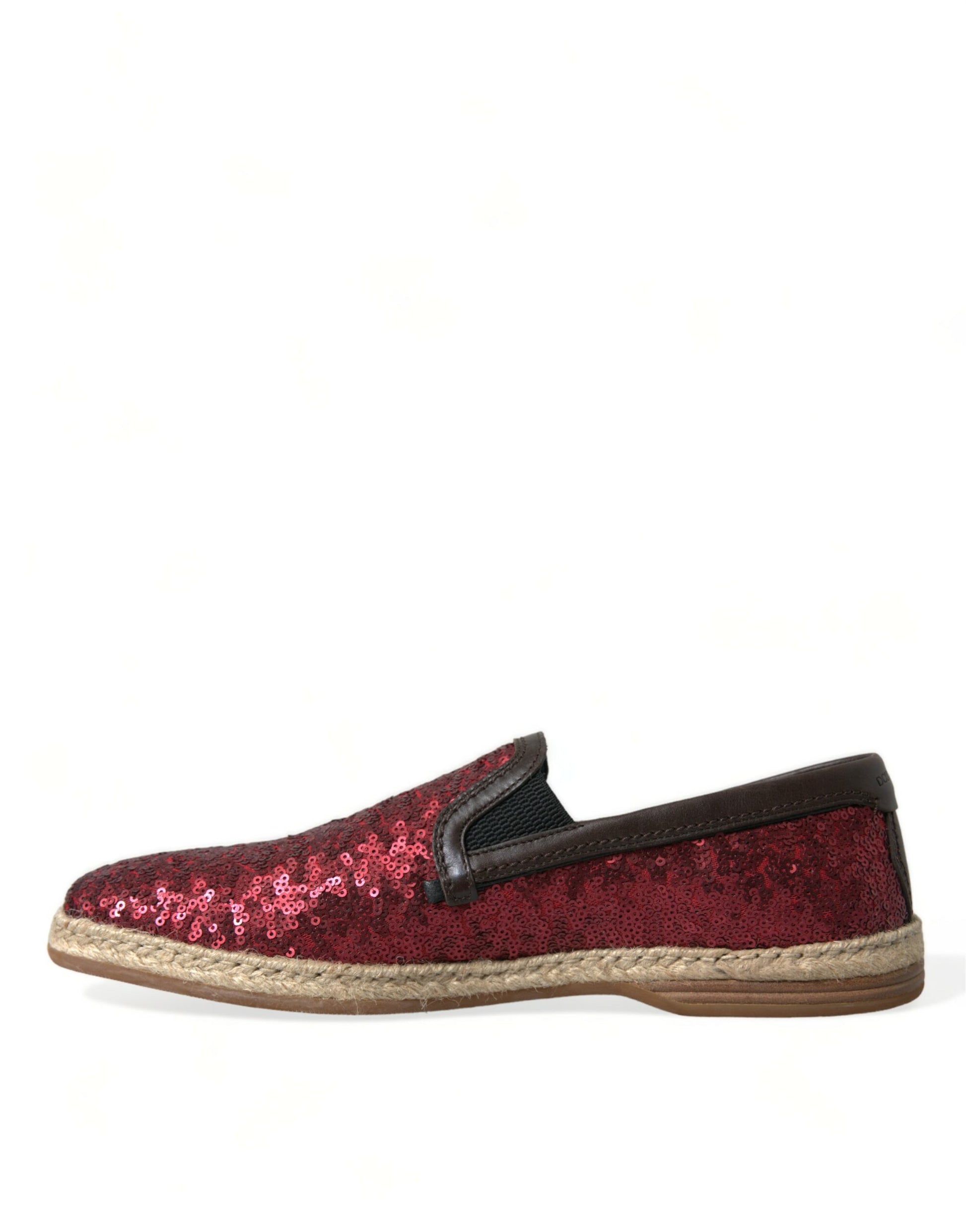Red glittery women's flat shoe with brown trim and strap