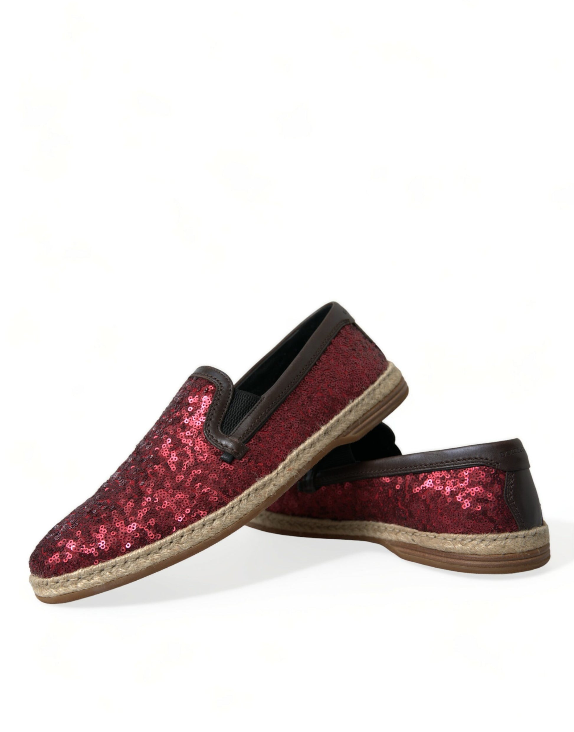 Pair of red glittery women's shoes with tan soles
