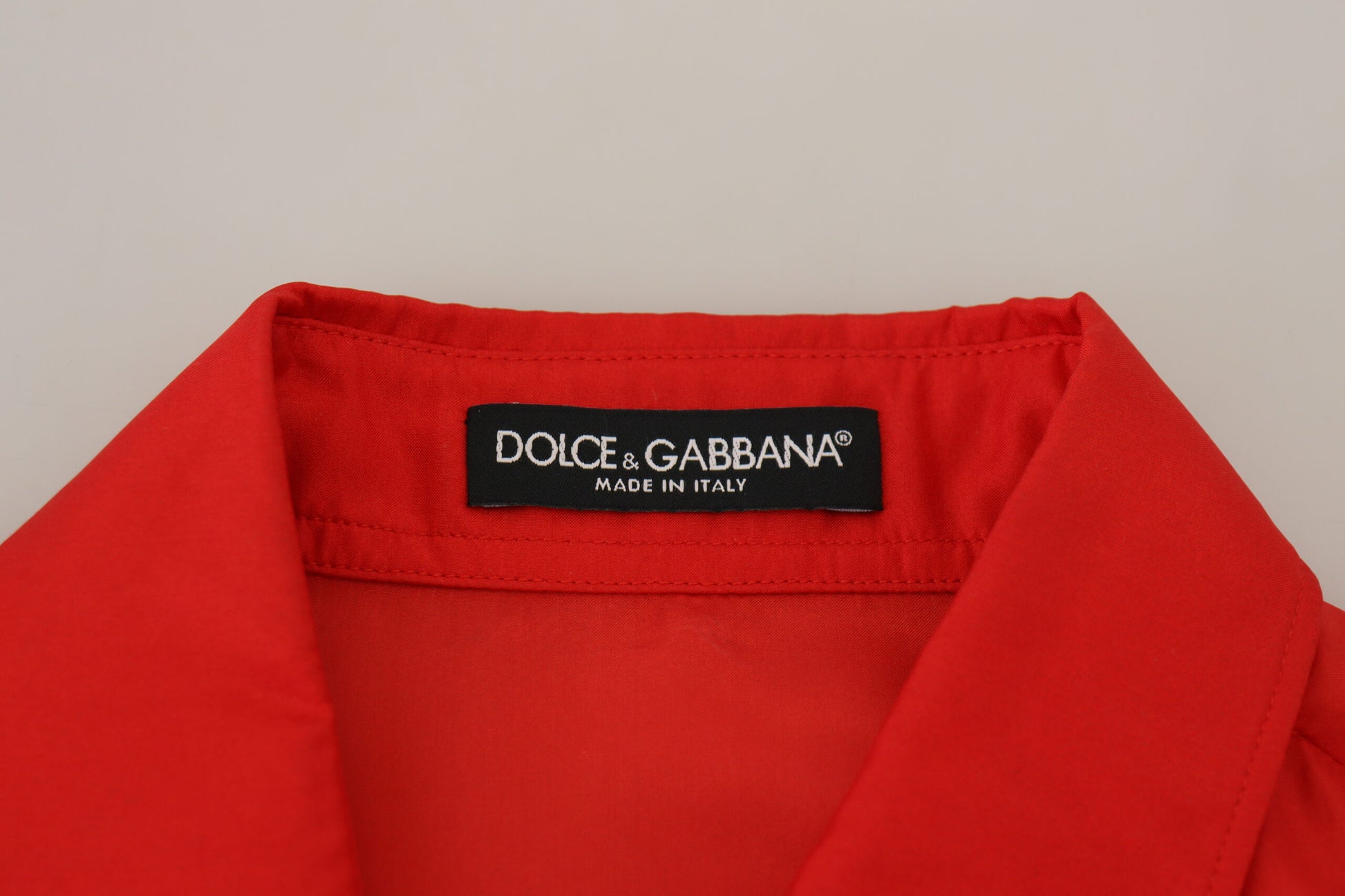 A red silk collared long sleeve dress shirt top from Dolce & Gabbana