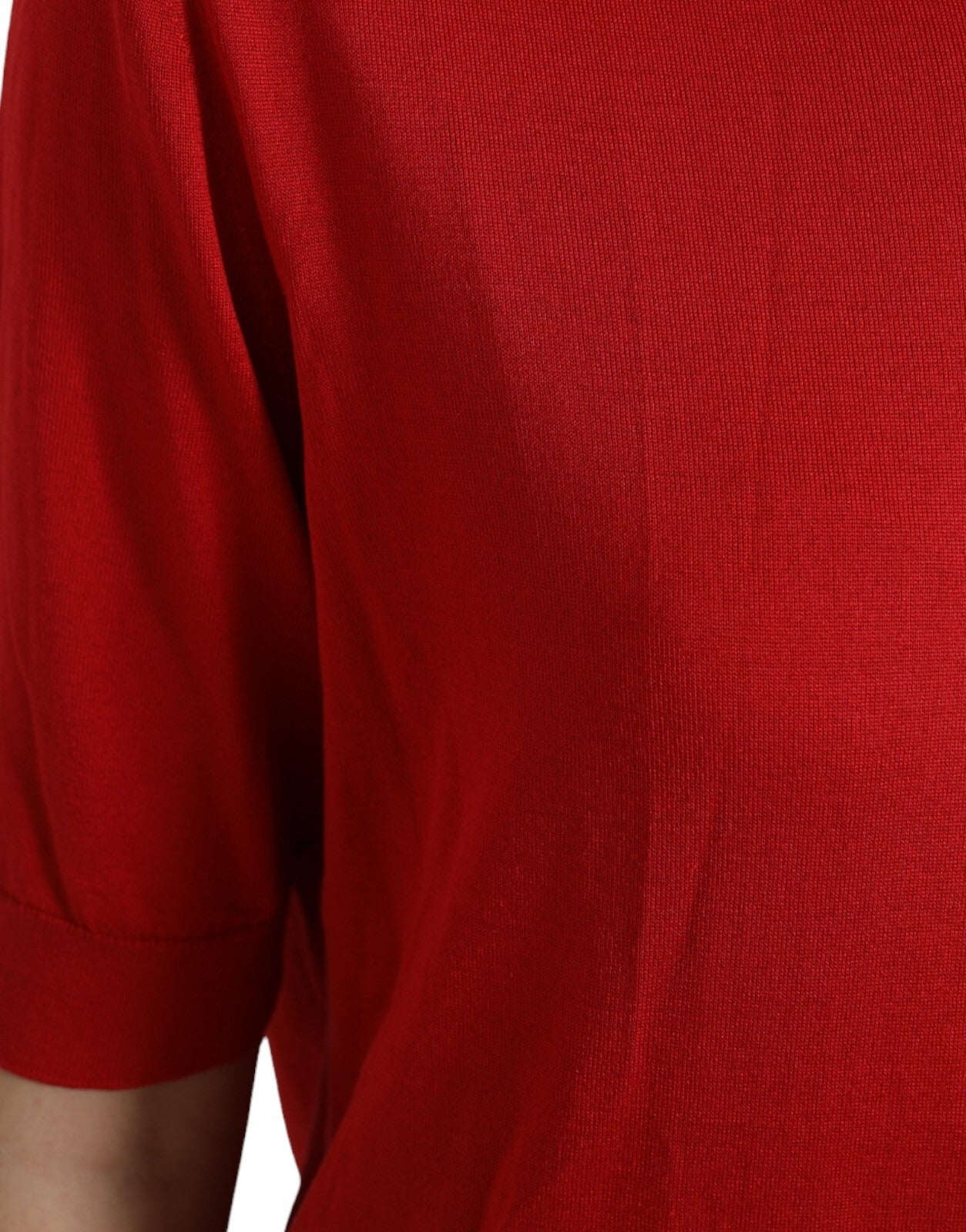 Red long sleeve shirt on mannequin